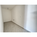 original_1791188524_minimalist-utility-room-with-exposed-light-fixture.png