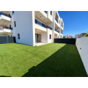 original_1790938636_modern-white-condo-with-sunny-turf-yard.png