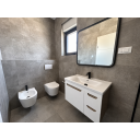 original_1791193069_modern-gray-tiled-bathroom-interior.png
