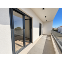 original_1791193142_sunlit-modern-balcony-with-glass-railing.png