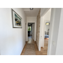 original_1790929498_modern-hallway-with-monet-artwork.png