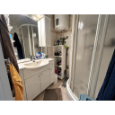 original_1792394589_cluttered-modern-bathroom-interior.png
