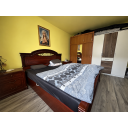 original_1792394609_cozy-bedroom-with-ornate-wooden-bed.png