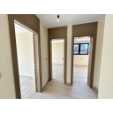 original_1792006895_modern-apartment-hallway-with-three-doorways.png