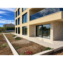 original_1792006924_modern-beige-home-with-reflective-glass.png