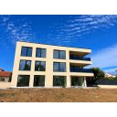 original_1792007176_modern-beige-apartment-under-blue-skies.png