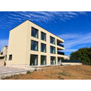 original_1792007207_modern-minimalist-home-under-blue-skies.png