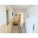 original_1791203874_bright-neutral-hallway-with-open-doorway.png