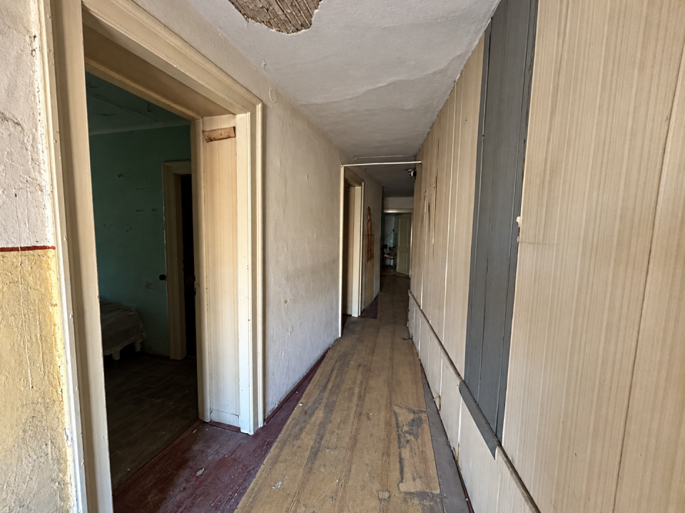 original_1792257688_worn-hallway-under-renovation.png