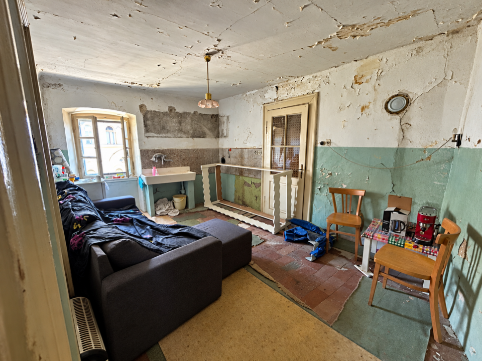 original_1792257701_crisp-restoration-of-a-dilapidated-living-kitchen.png
