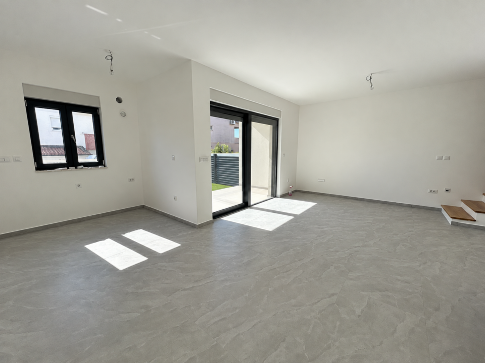 original_1791188431_bright-minimalist-room-with-sunlit-patio-doors.png