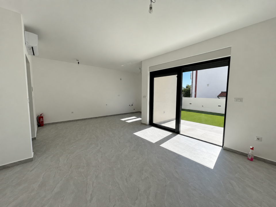 original_1791188728_sunlit-minimalist-room-with-patio-doors.png