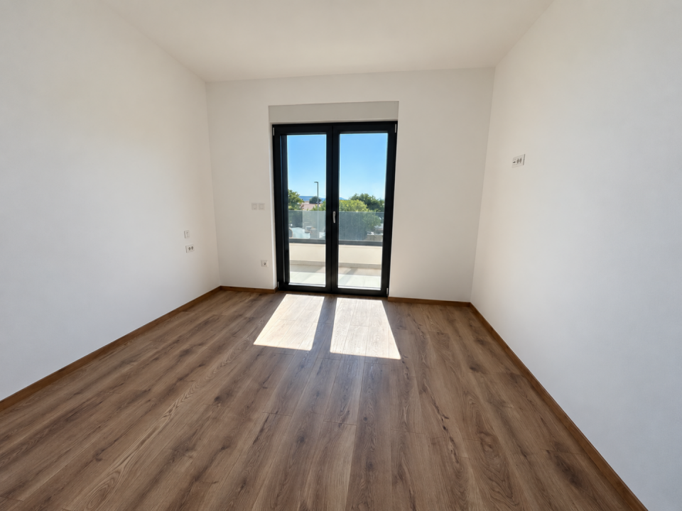 original_1791192970_bright-minimalist-room-with-glass-balcony-door.png