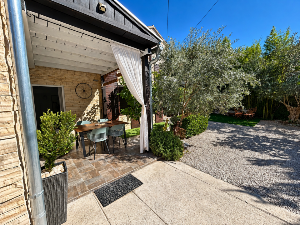 original_1790929350_sunlit-garden-patio-with-olive-trees.png