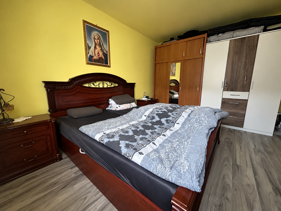 original_1792394609_cozy-bedroom-with-ornate-wooden-bed.png