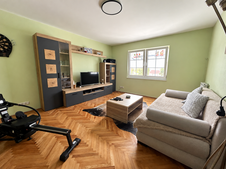 original_1792394636_modern-living-room-with-warm-wood-accents.png
