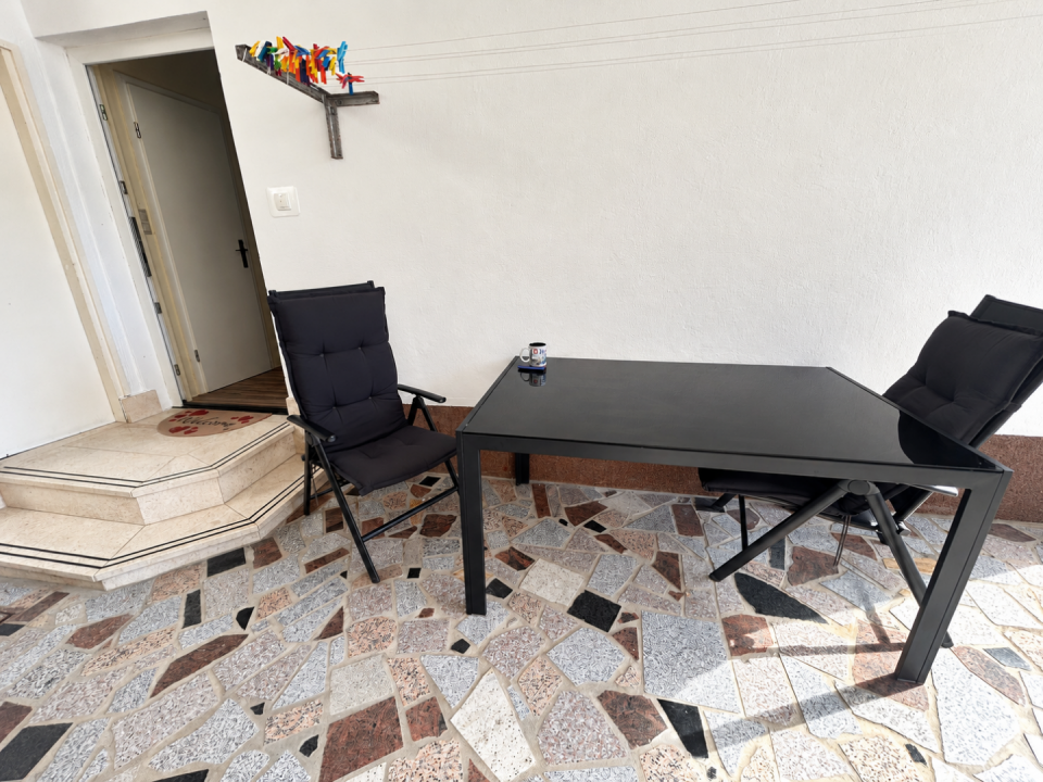 original_1792394666_cozy-patio-entryway-with-folding-chairs.png