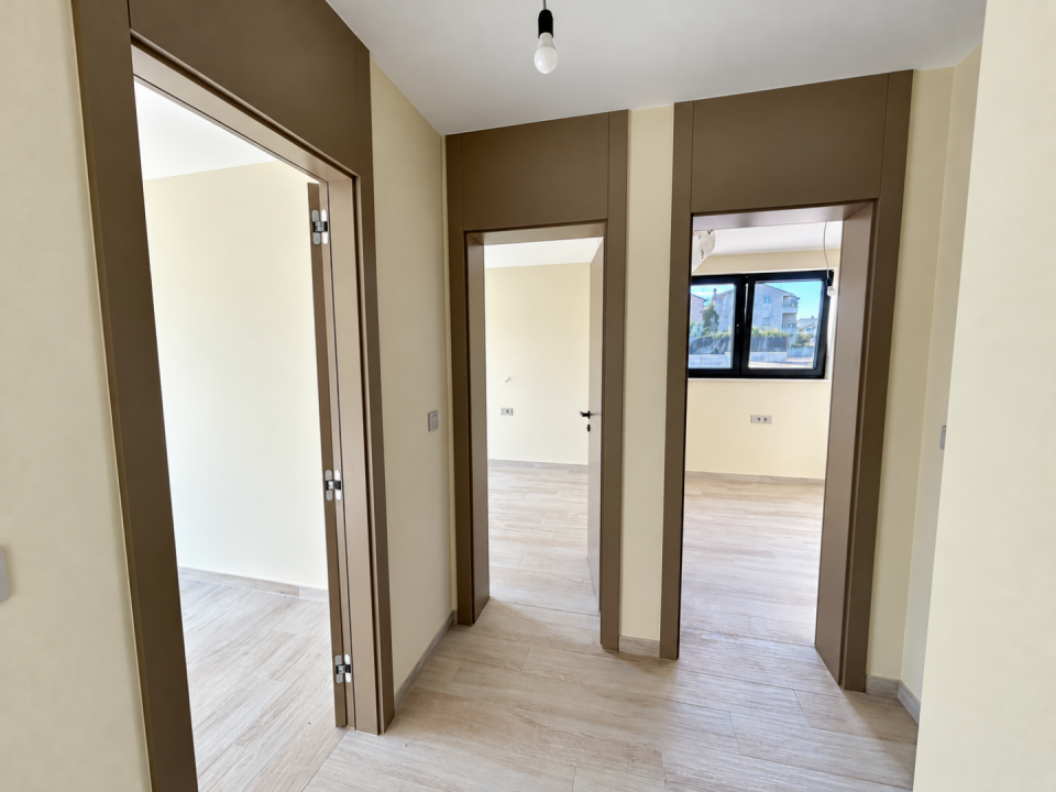 original_1792006895_modern-apartment-hallway-with-three-doorways.png