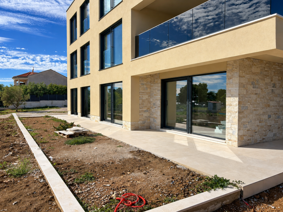original_1792006924_modern-beige-home-with-reflective-glass.png