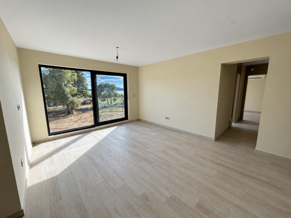 original_1792007166_sunlit-empty-room-with-lake-view.png