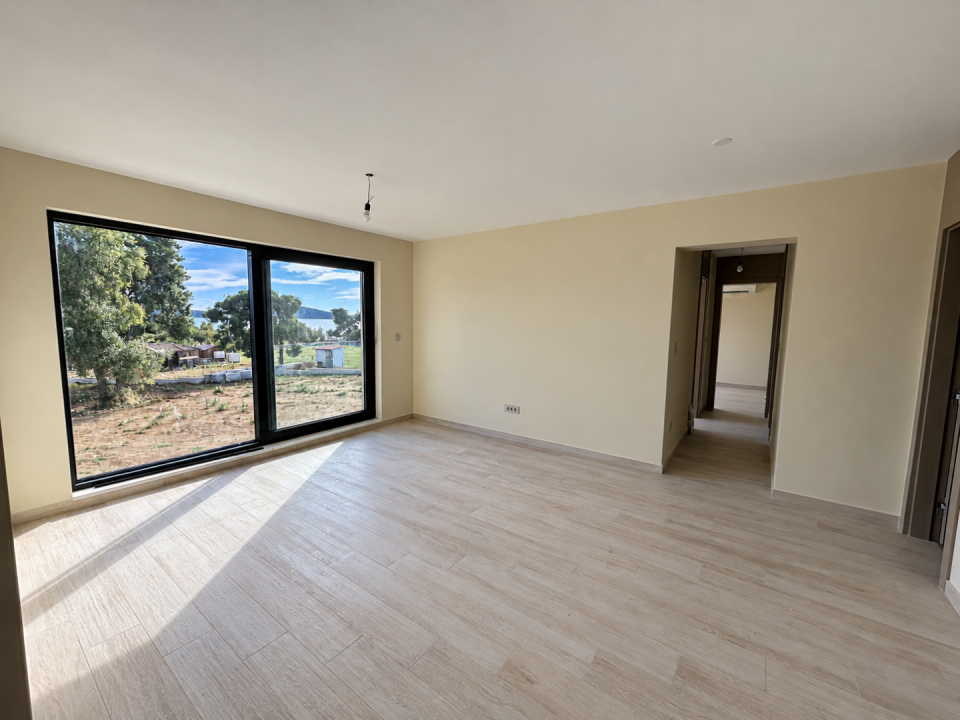 original_1792007180_sunlit-empty-room-with-seaside-view.png