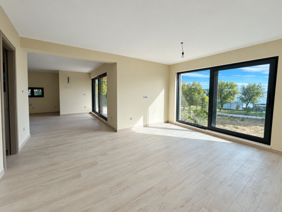 original_1792007196_sunlit-minimalist-interior-with-lake-view.png