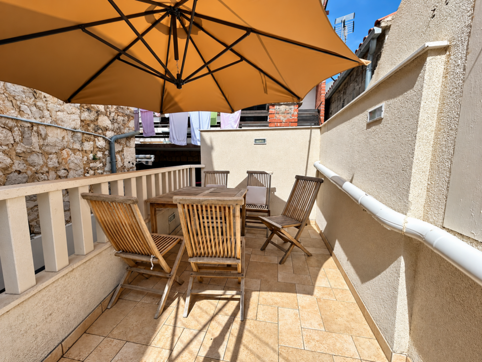 original_1791203971_sunlit-mediterranean-terrace-dining-area.png